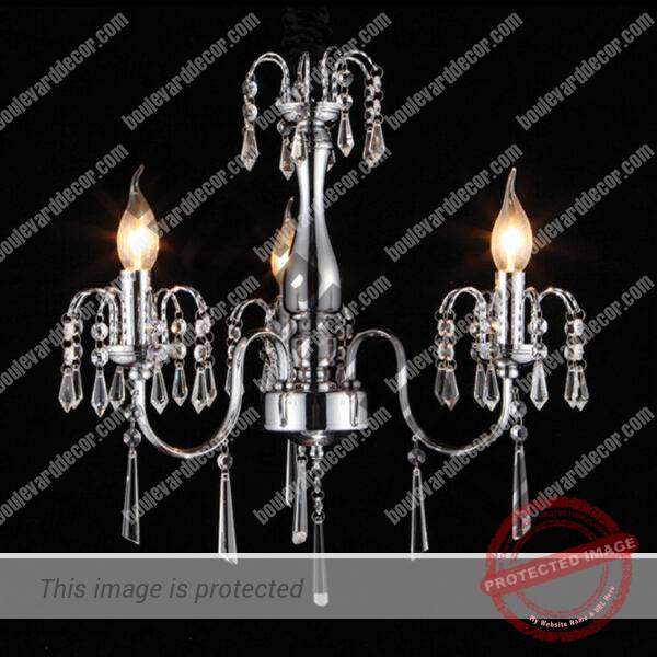 Elegant Crystal Chandelier with 3 lights.